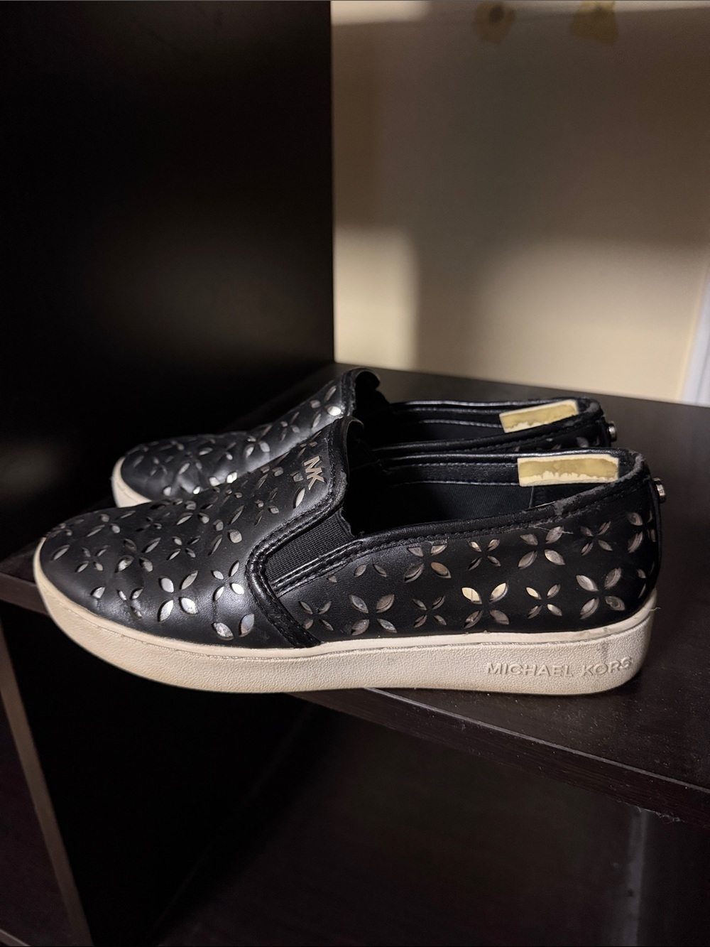 Michael Kors Black Slip-On Perforated Leather Sneakers with White Sole